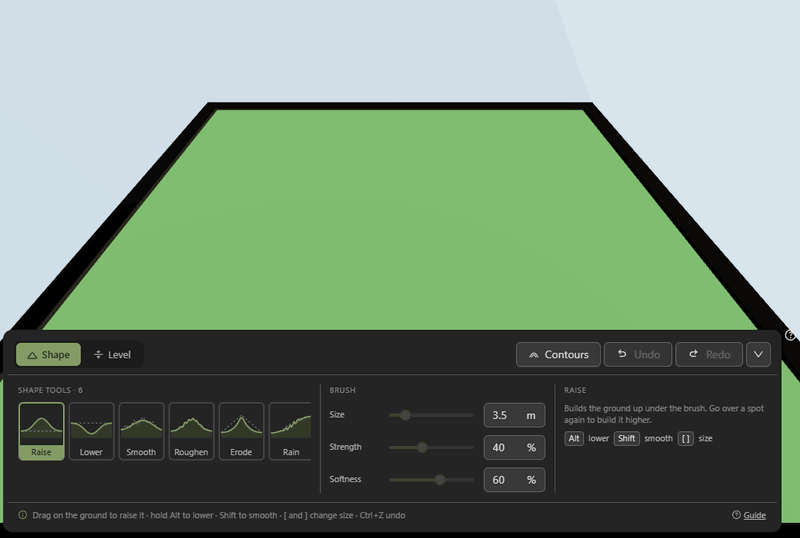 Dragging Raise across a flat board to build a hill, then switching to Lower and dragging beside it to dig a valley below the board